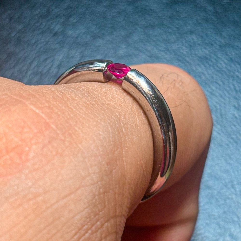 Steel ring with red zirconia